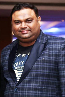 Dinesh Maghudia - Founder - Sync Entertainment